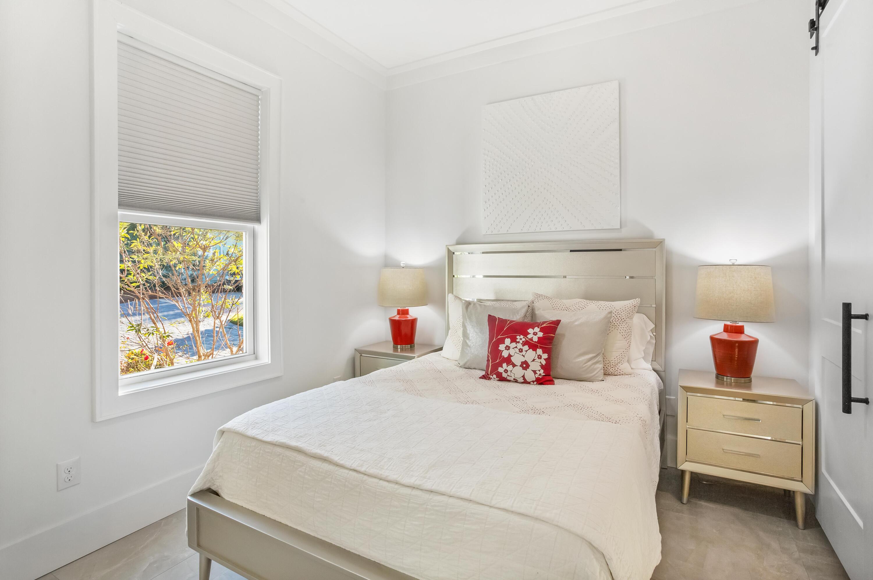 4627 Sunset Pointe Destin, FL 32541 - Photo 31 of 64 a bedroom with a bed and a closet