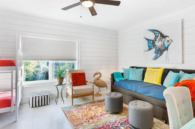 a bathroom with a toilet sink and shower