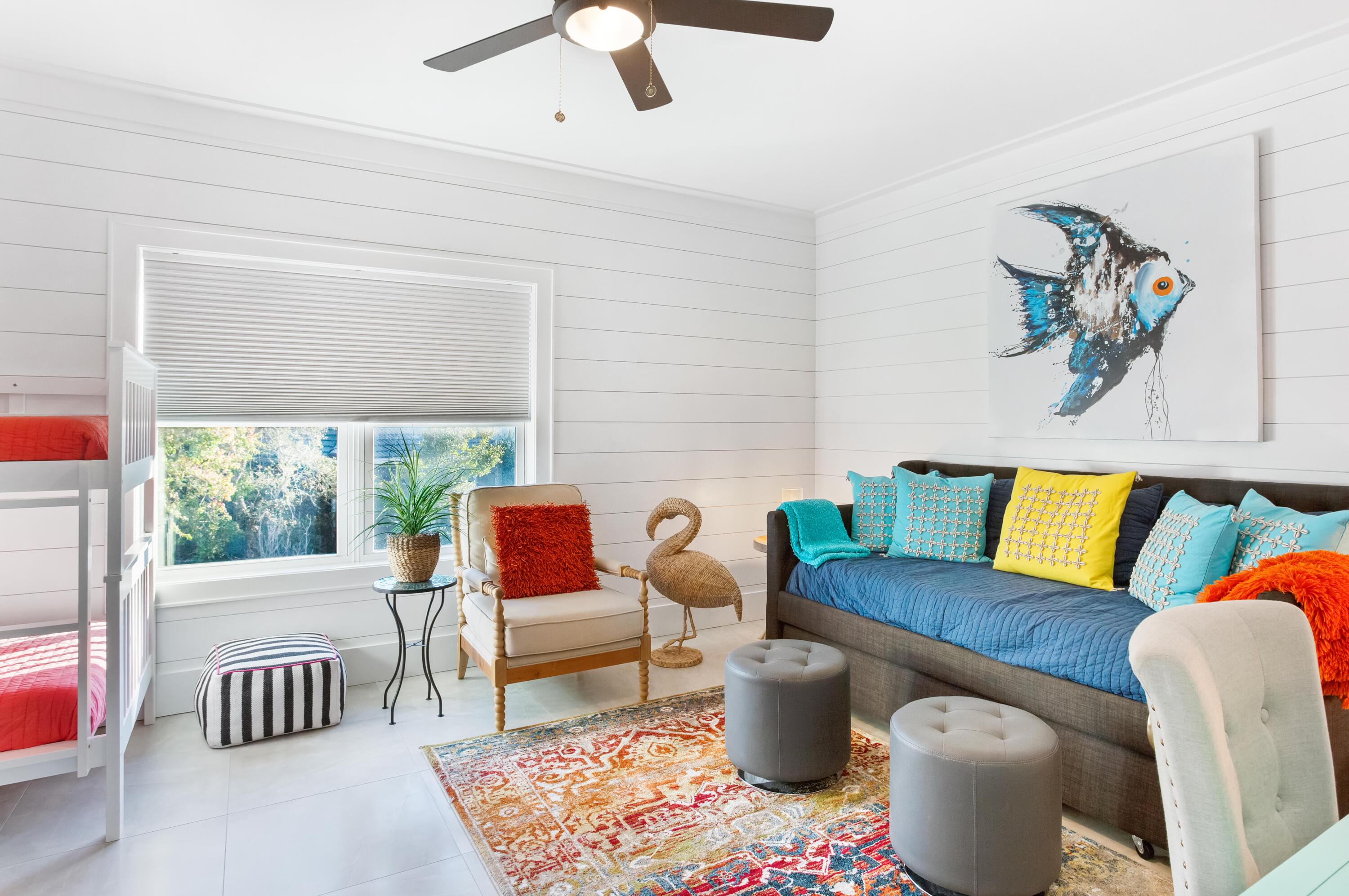 4627 Sunset Pointe Destin, FL 32541 - Photo 36 of 64 a living room with furniture and a large window