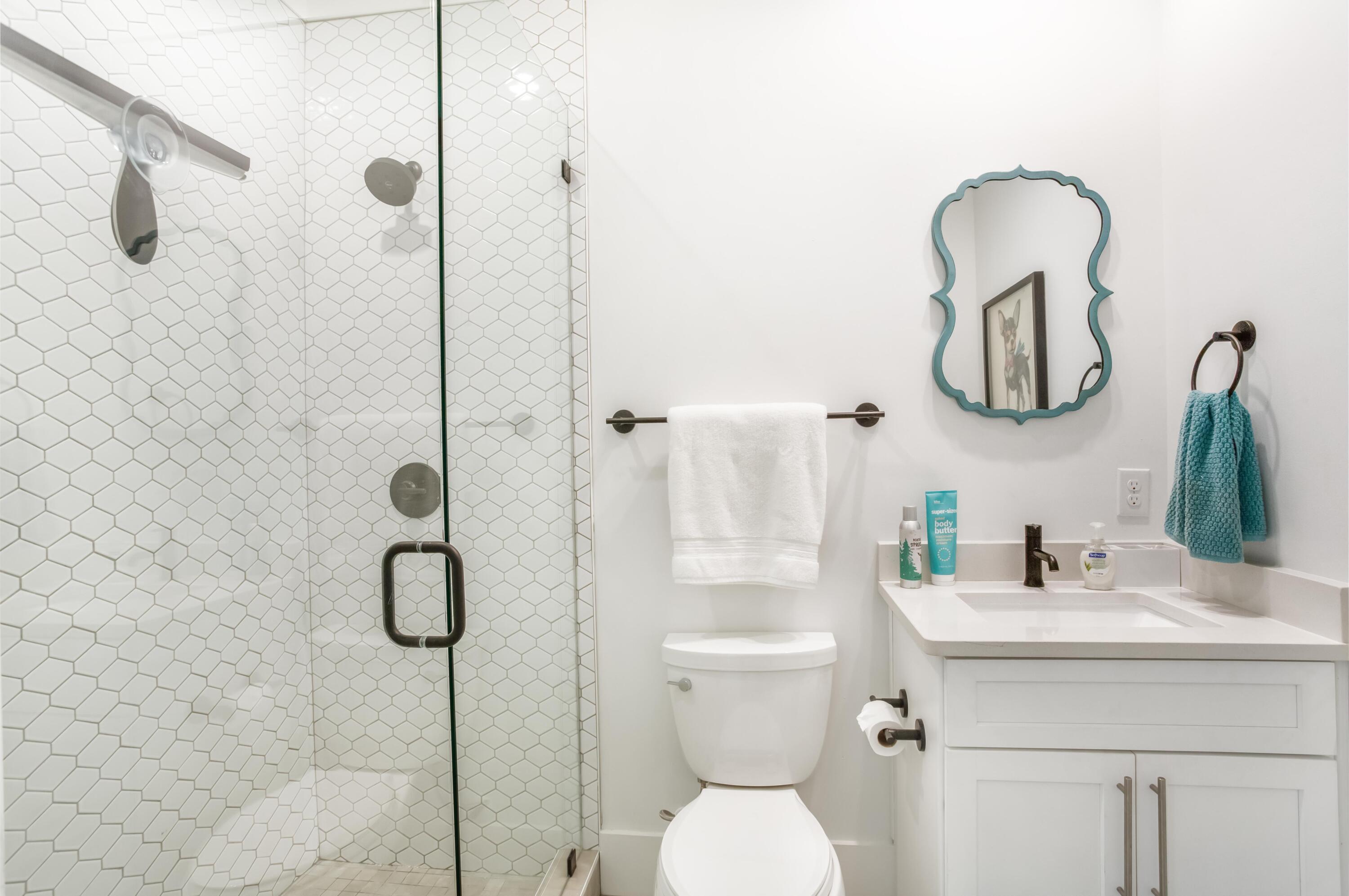 4627 Sunset Pointe Destin, FL 32541 - Photo 43 of 64 a bathroom with a toilet sink and shower