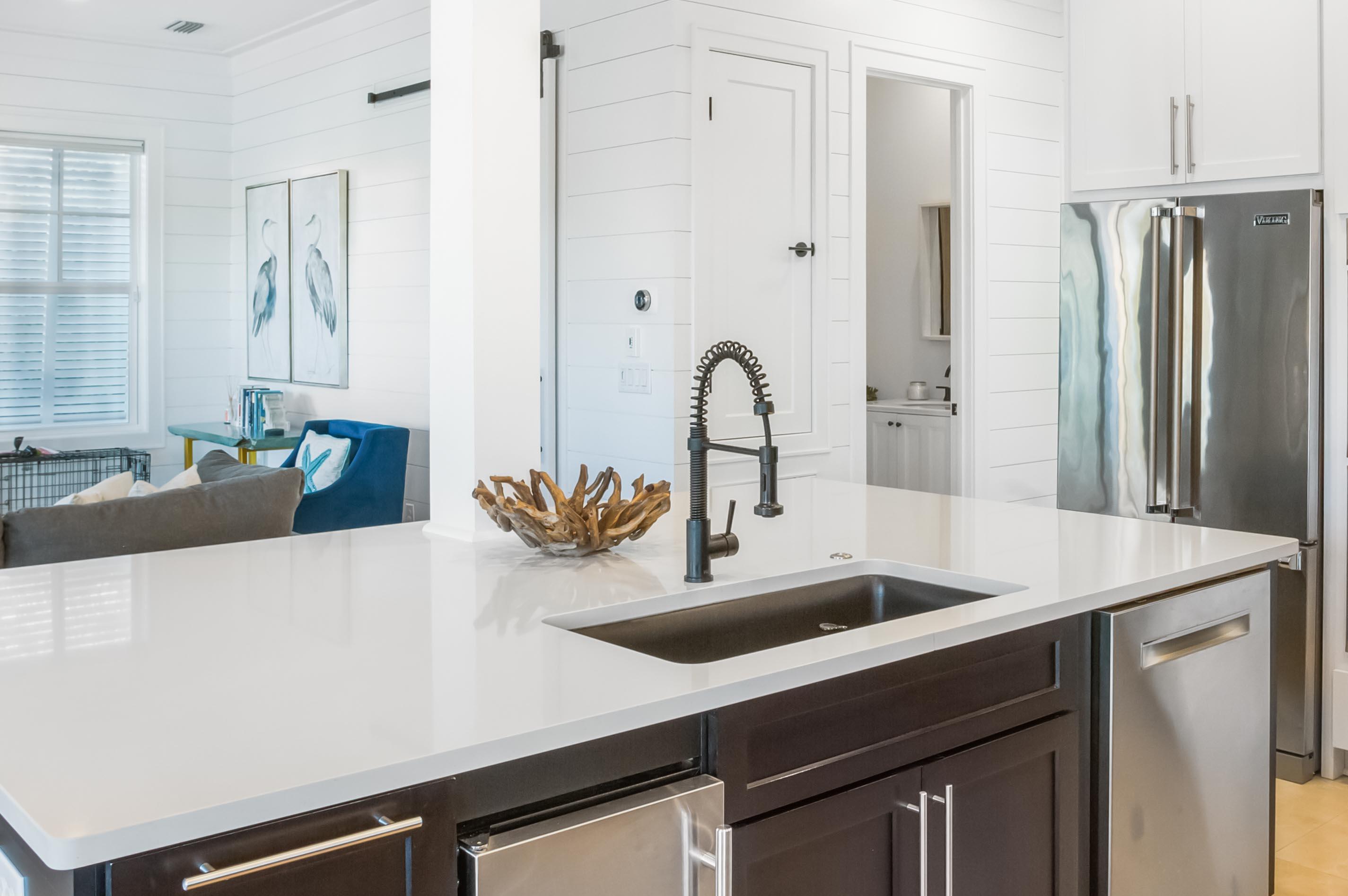 4627 Sunset Pointe Destin, FL 32541 - Photo 10 of 64 a kitchen with a refrigerator and a sink