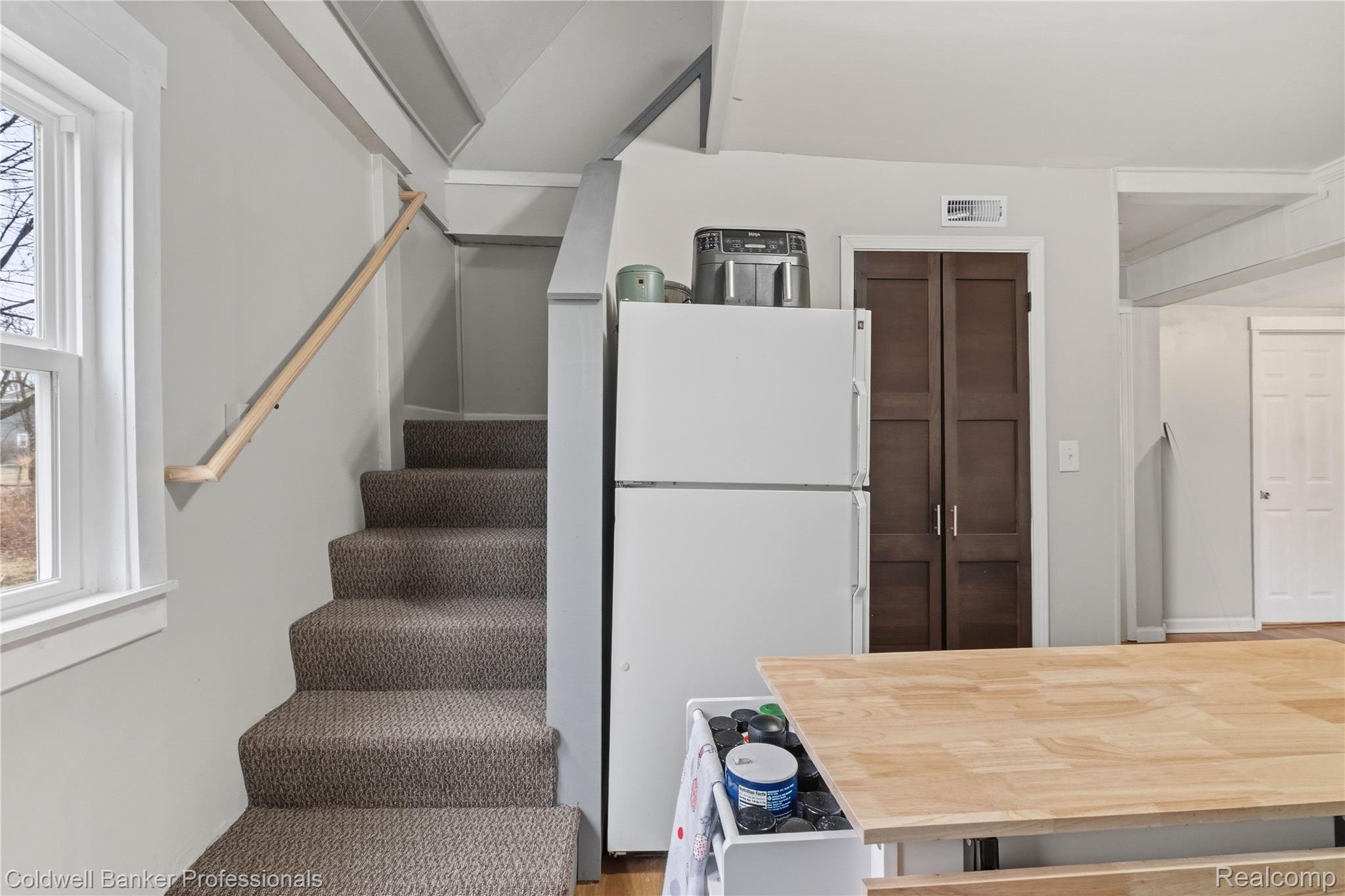 3040 Inman Street Ferndale, MI 48220 - Photo 23 of 41 Stairs featuring plenty of natural light and wood finished floors