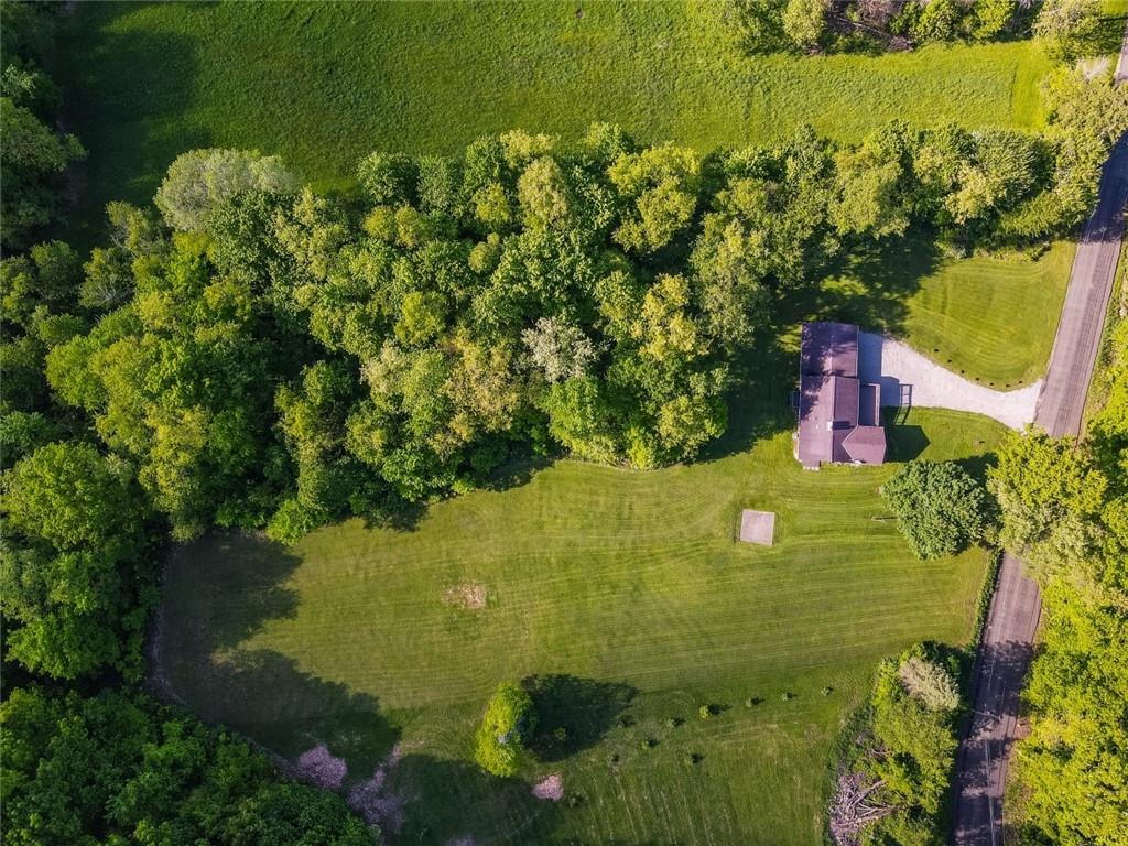 1381 Logan Road Gibsonia, PA 15044 - Photo 20 of 24 a view of a lake with a yard