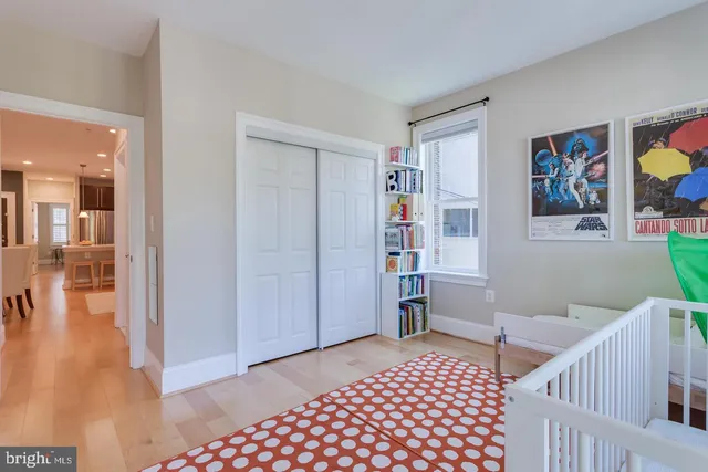 a view of a balcony with wooden floor