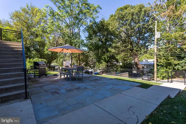 a view of a backyard of a house