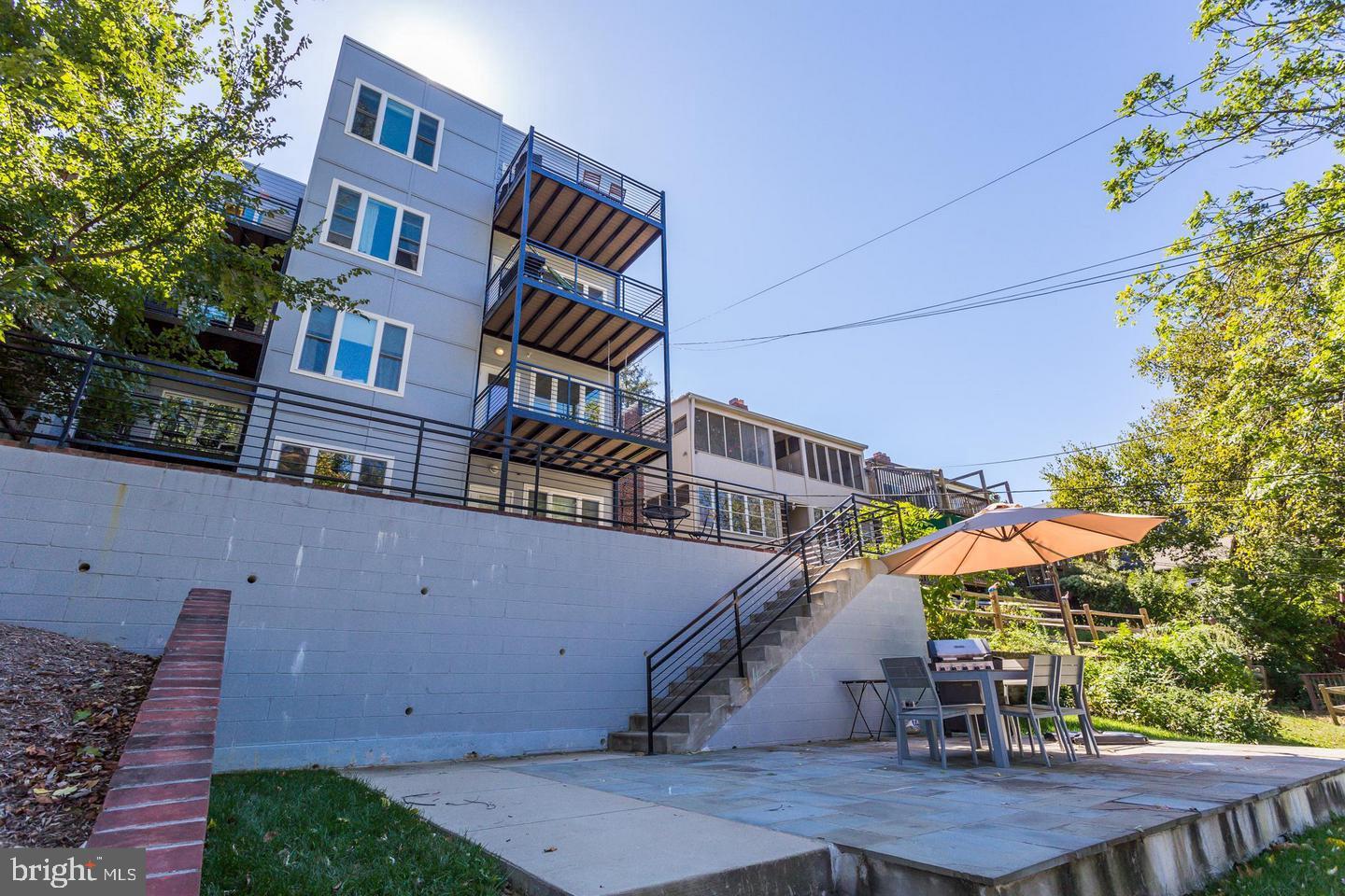 3937 Davis Place Northwest, Unit 3 Washington, DC 20007 - Photo 19 of 20 front view of a building with a yard