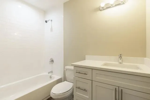 a bathroom with a sink and a bathtub