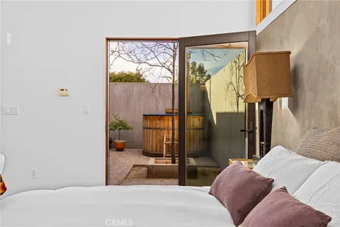 a view of a hallway with bathroom