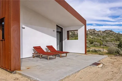 a outdoor space with a bench and couch