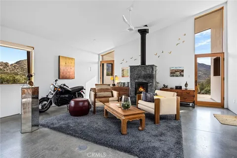 a view of a living room with furniture