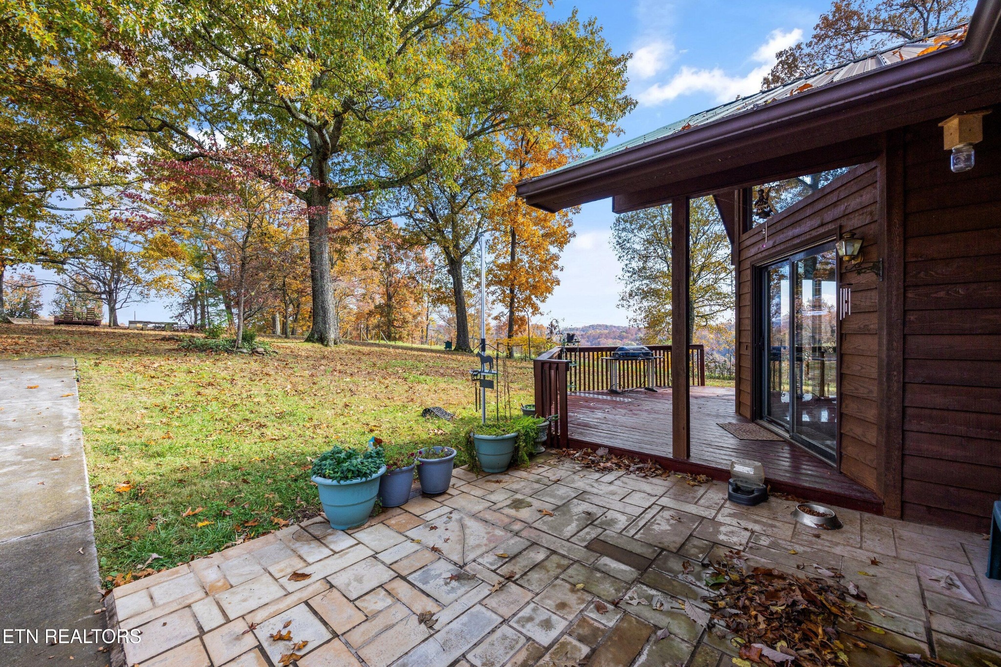 235 Davidson Hollow Road Heiskell, TN 37754 - Photo 14 of 43 a front view of a house with a yard