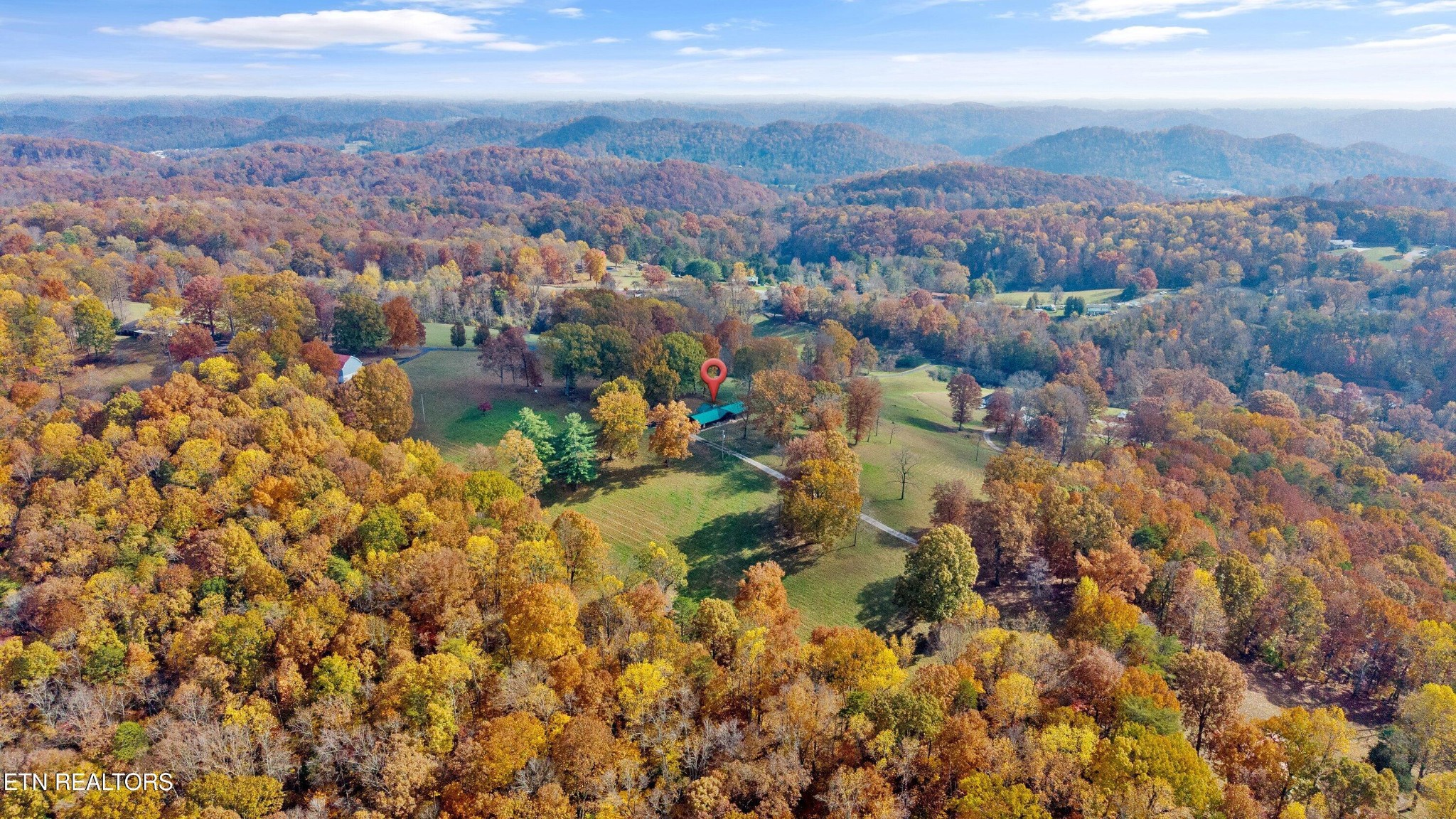 235 Davidson Hollow Road Heiskell, TN 37754 - Photo 18 of 43 an aerial view of residential houses with city view and mountain view