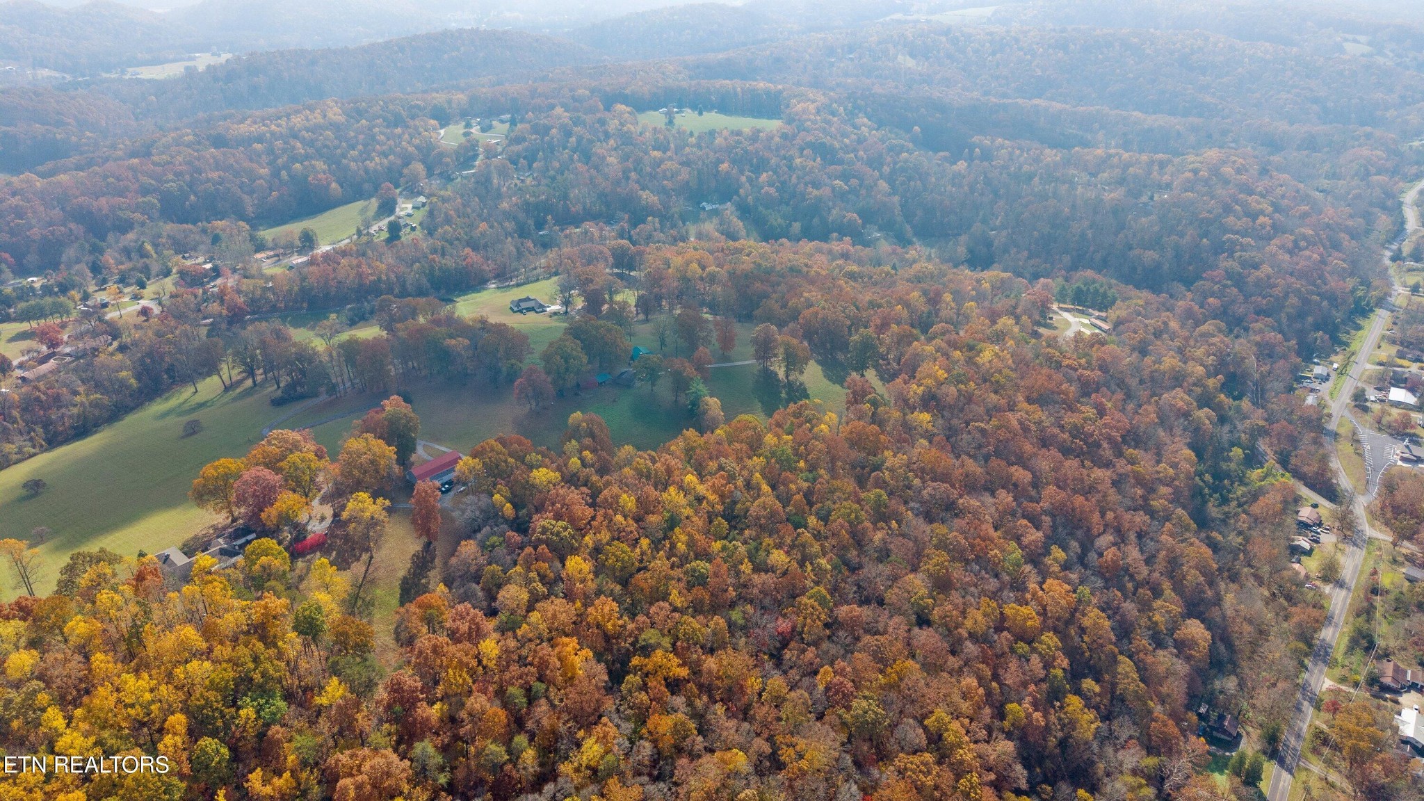 235 Davidson Hollow Road Heiskell, TN 37754 - Photo 20 of 43 a view of a lake with a mountain