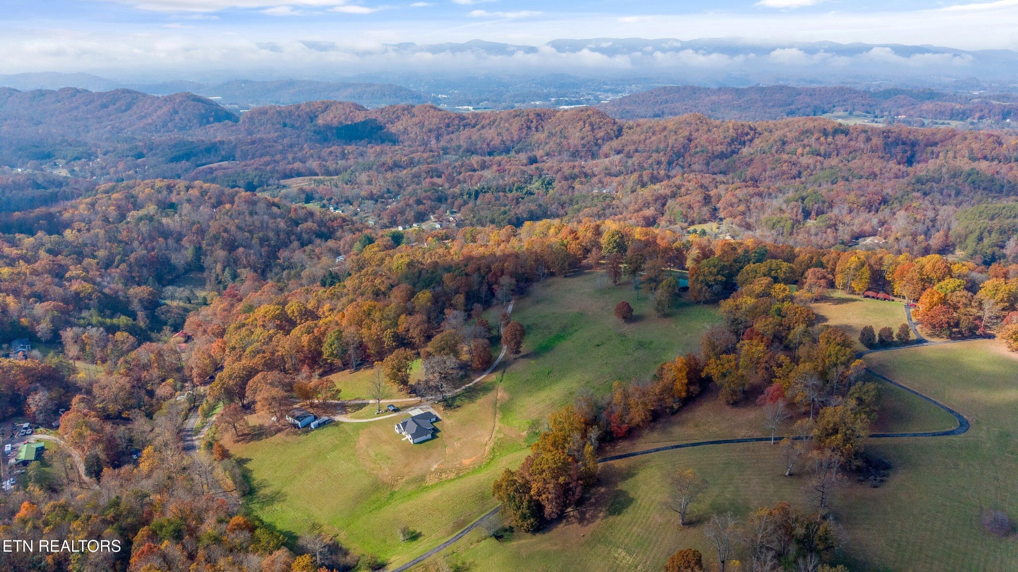 235 Davidson Hollow Road Heiskell, TN 37754 - Photo 22 of 43 an aerial view of residential houses with outdoor space