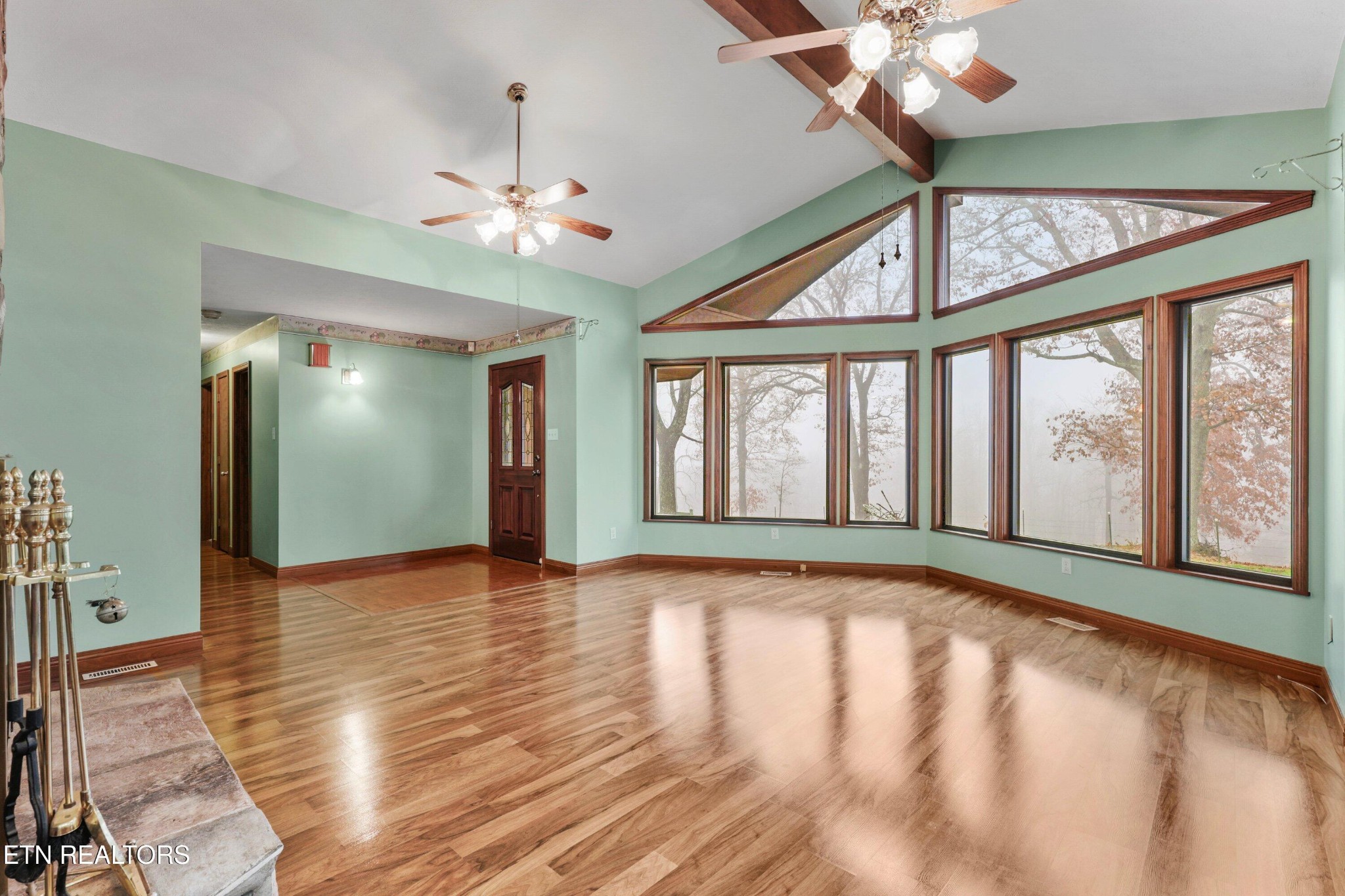 235 Davidson Hollow Road Heiskell, TN 37754 - Photo 25 of 43 a view of an empty room with chandelier fan and a large window