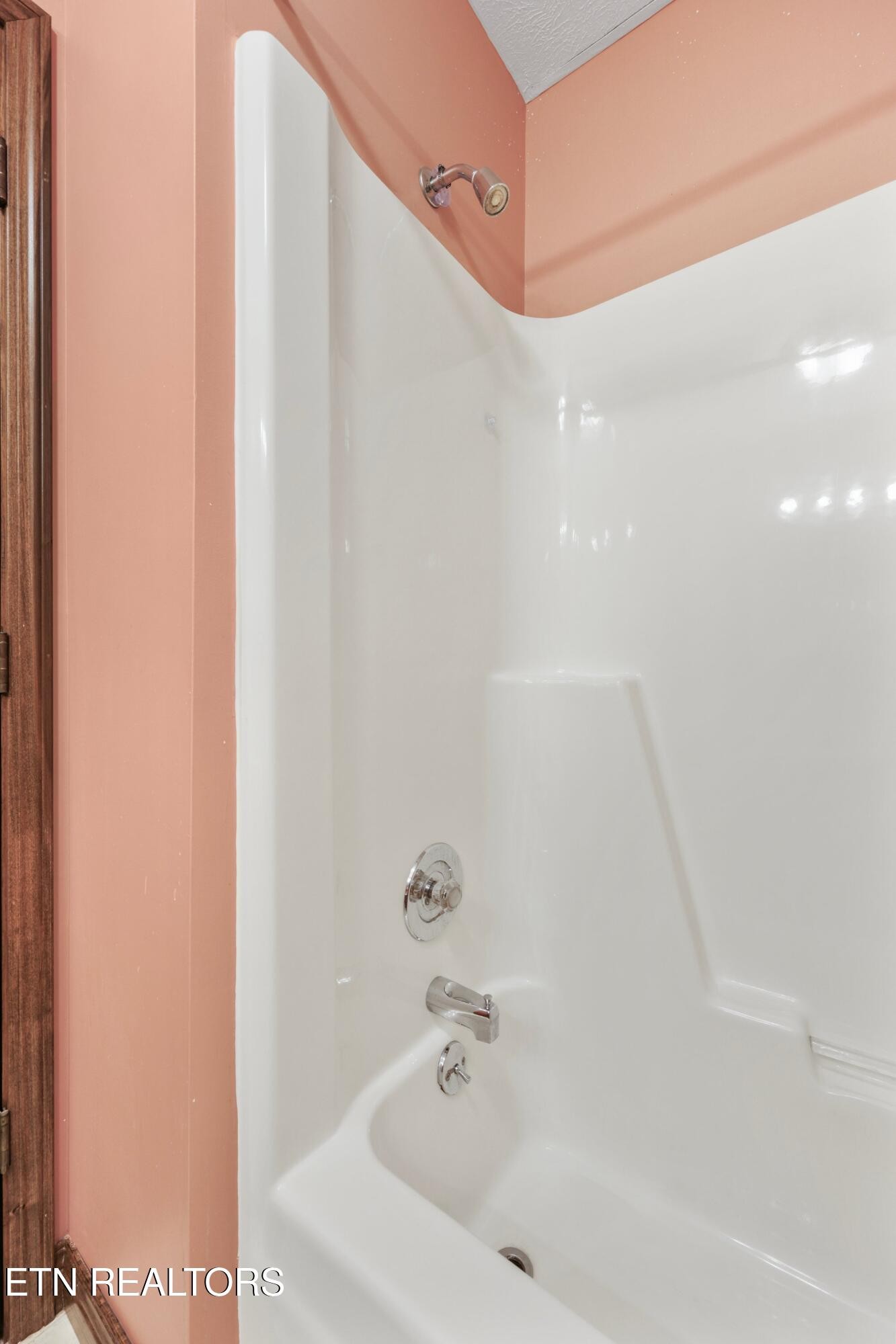 235 Davidson Hollow Road Heiskell, TN 37754 - Photo 42 of 43 a bathroom with a bathtub