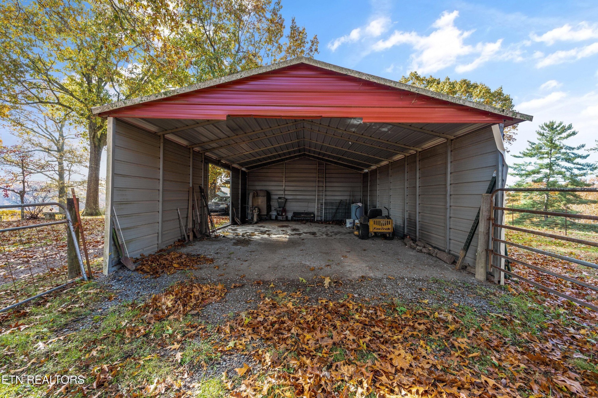 235 Davidson Hollow Road Heiskell, TN 37754 - Photo 9 of 43 a front view of a house with a yard