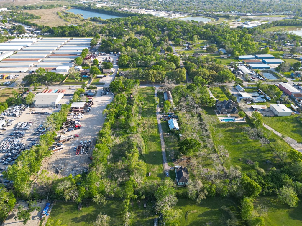 729 Crenshaw Road Houston, TX 77504 - Photo 7 of 7 a view of residential houses with outdoor space and trees