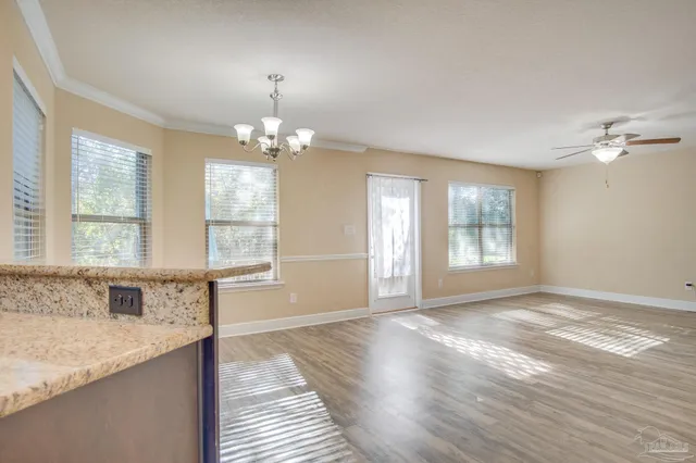 a view of a bathroom with dual sinks