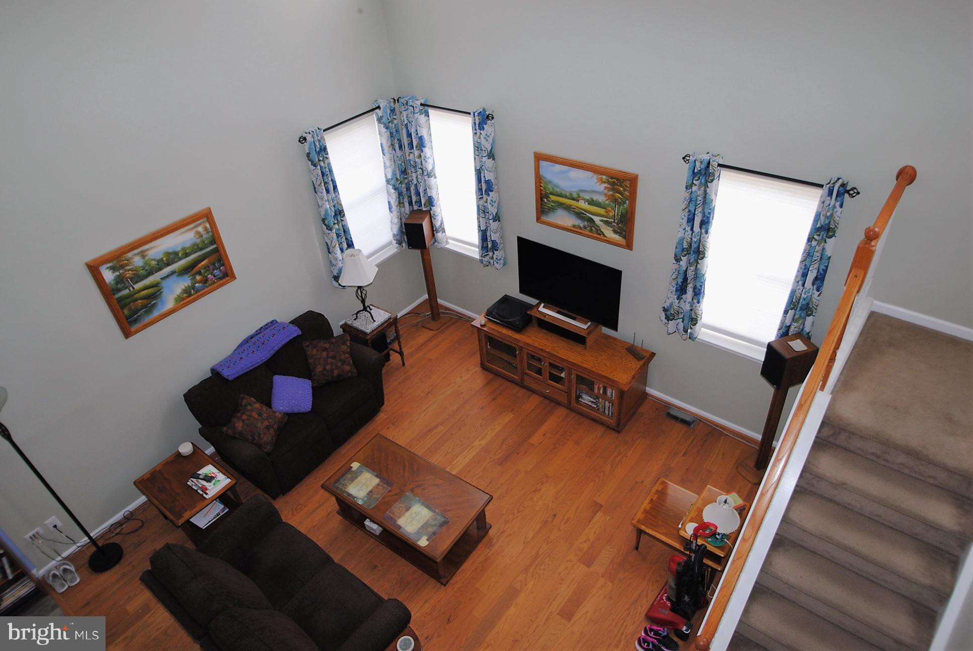 21 Doolin Bay Drive Bear, DE 19701 - Photo 37 of 82 View from stairs to main living room