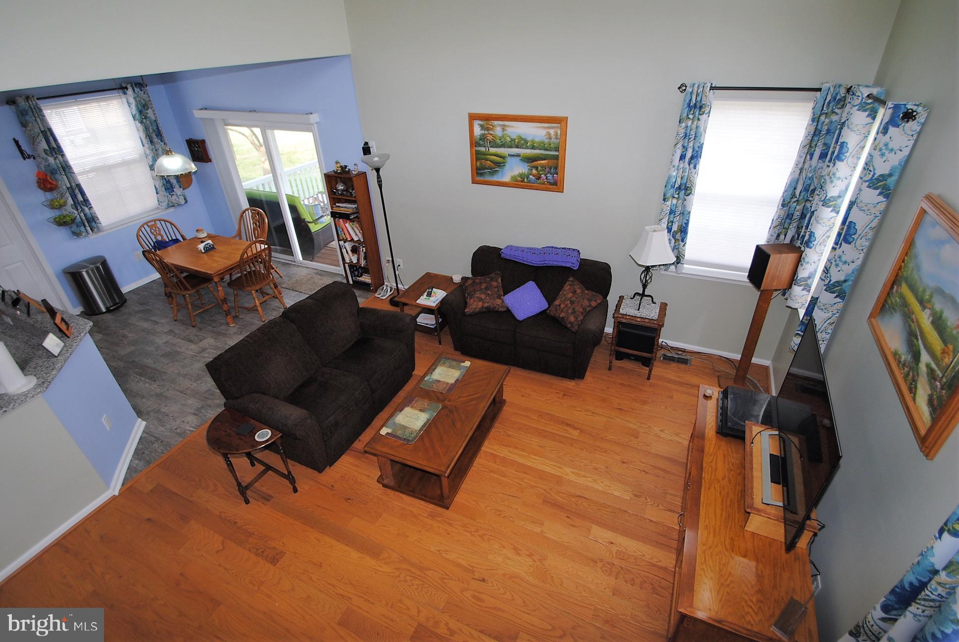 21 Doolin Bay Drive Bear, DE 19701 - Photo 39 of 82 View from stairs to main living room