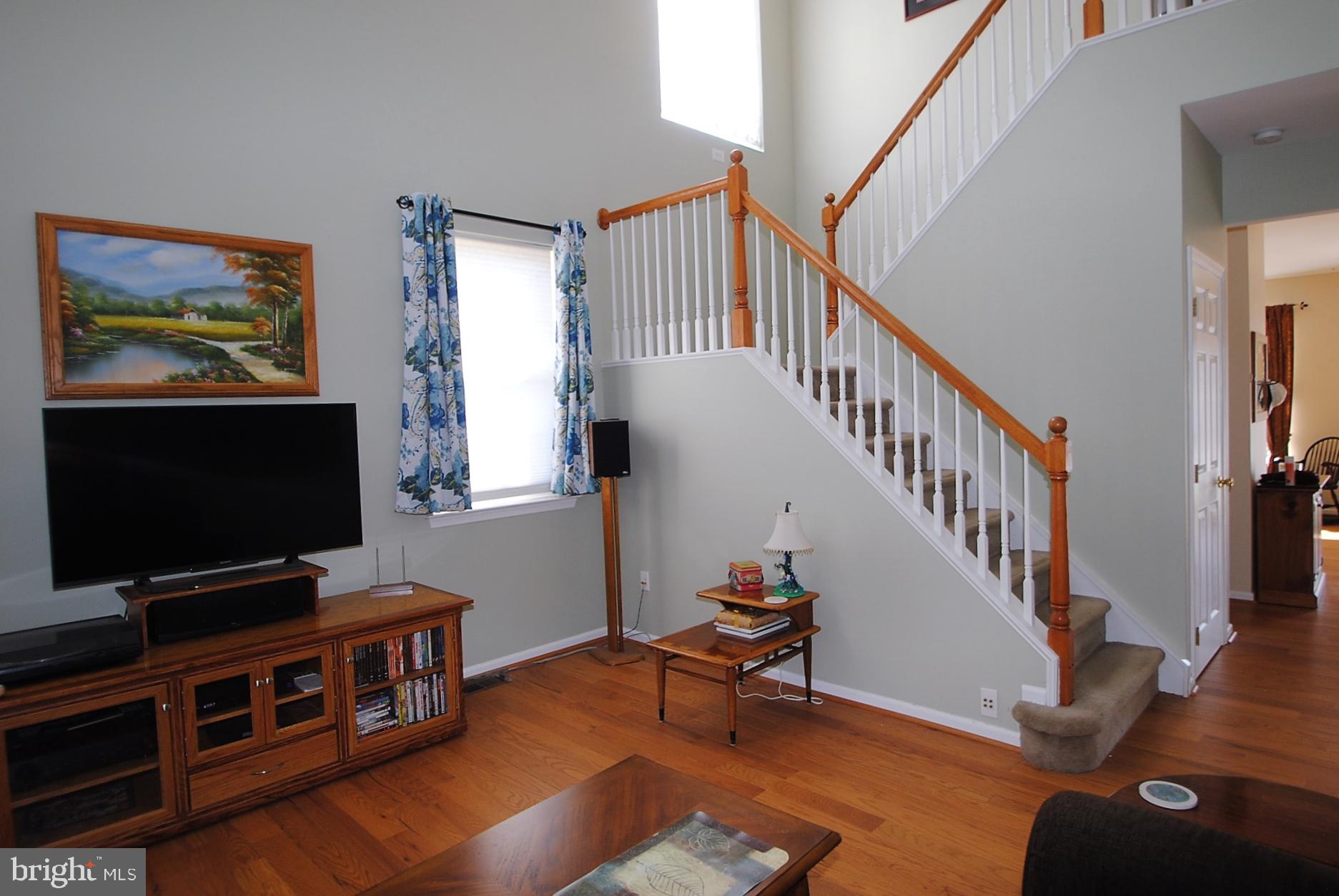 21 Doolin Bay Drive Bear, DE 19701 - Photo 47 of 82 Living room view of stairs