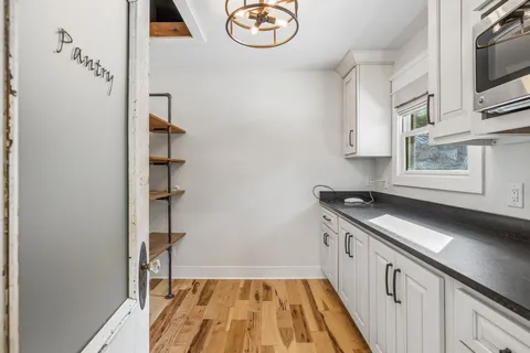 a view of an empty room and window