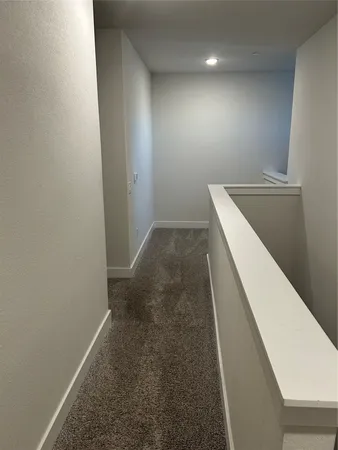 a bathroom with a shower sink and mirror