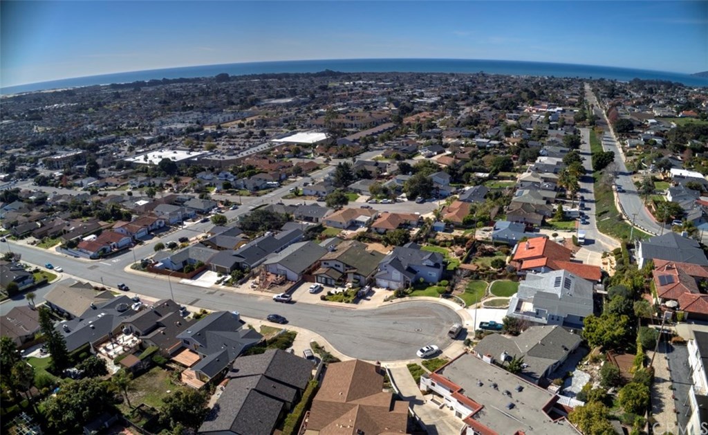 244 Ruth Ann Way Arroyo Grande, CA 93420 - Photo 1 of 1 Overhead view of home (brown roof at bottom of picture) showing the ocean view and the culdesac neighborhood at the top of Ruth Ann Way