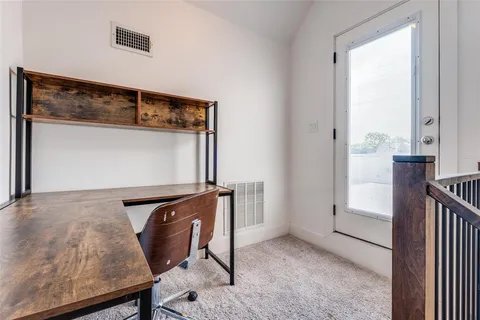 a room with furniture and window