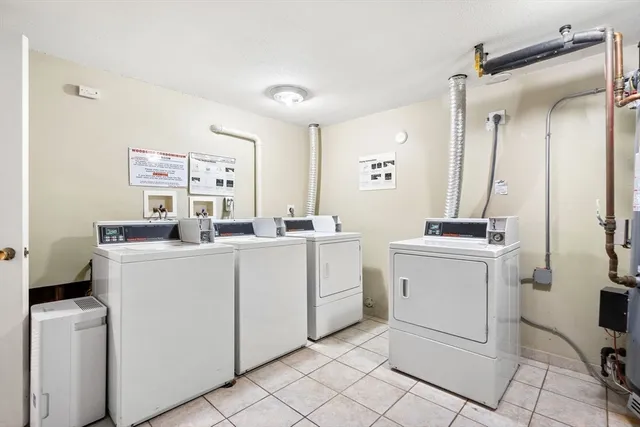 a view of a cars parked in front of a house