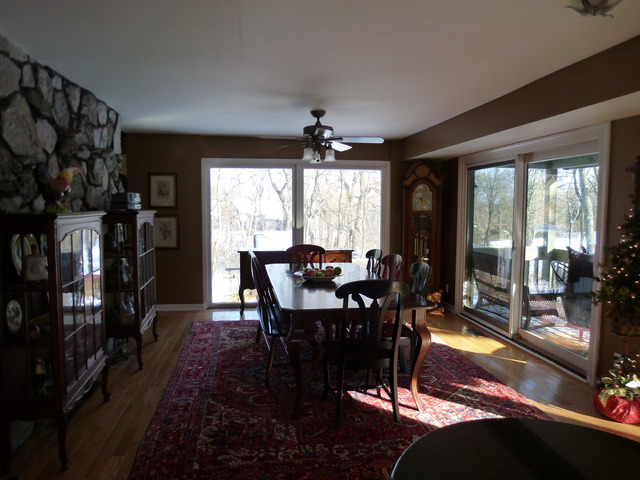 4012 Oak Ridge Road Crystal Lake, IL 60012 - Photo 9 of 24 a view of a dining room with furniture window and outside view