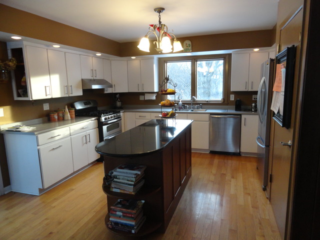 4012 Oak Ridge Road Crystal Lake, IL 60012 - Photo 10 of 24 a kitchen with stainless steel appliances granite countertop a sink stove and refrigerator