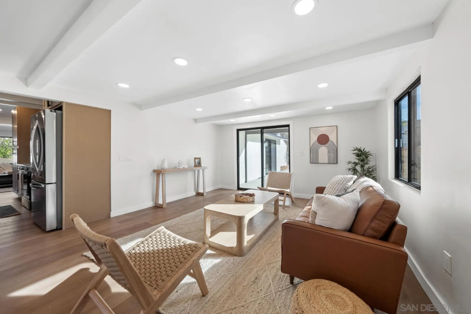 661 Concepcion Avenue Spring Valley, CA 91977 - Photo 12 of 43 a living room with a couch and a table