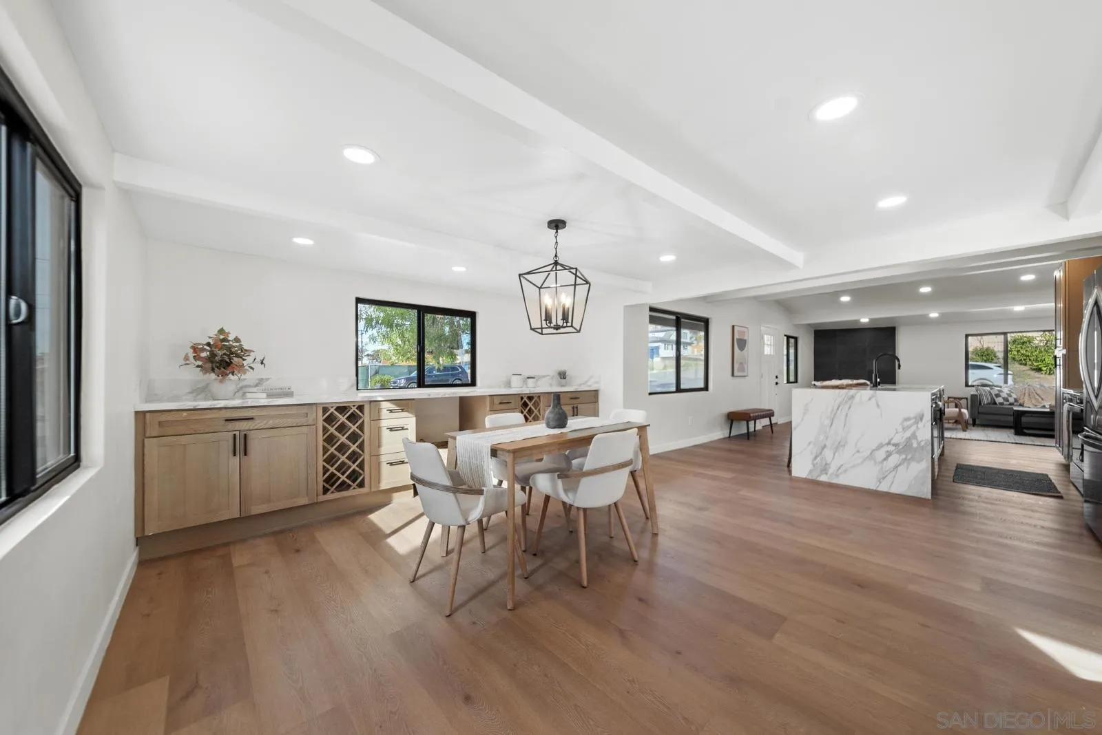 661 Concepcion Avenue Spring Valley, CA 91977 - Photo 13 of 43 a view of a dining room with furniture window and wooden floor