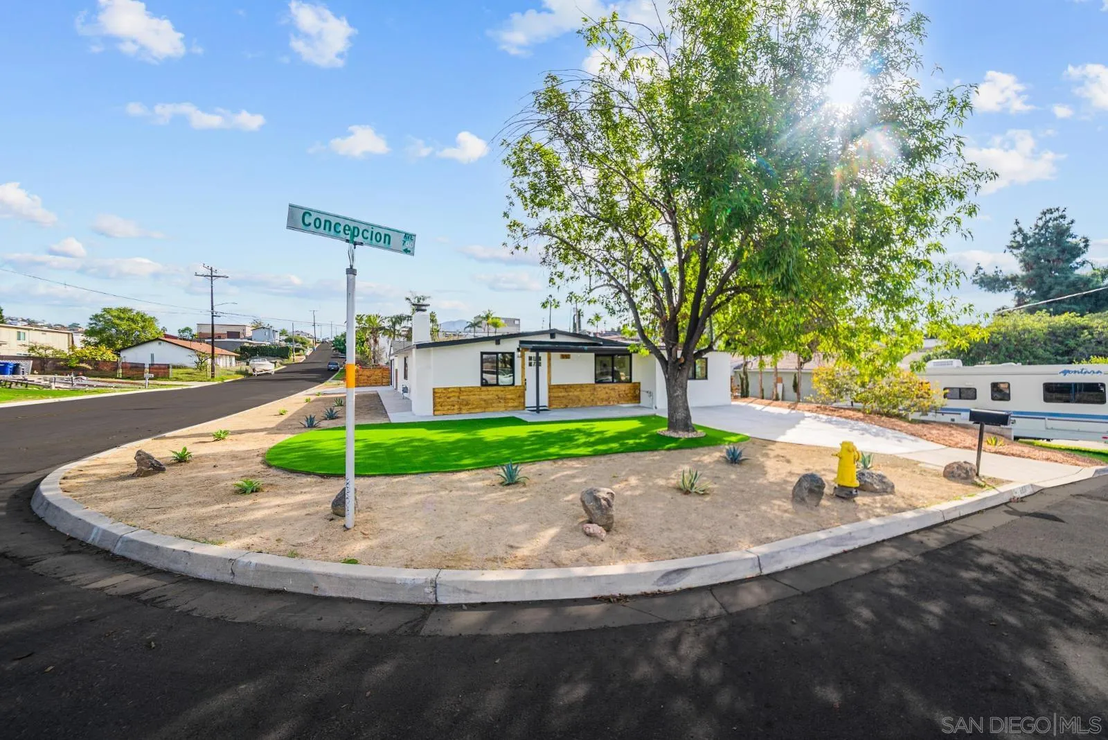 661 Concepcion Avenue Spring Valley, CA 91977 - Photo 6 of 43 a view of a swimming pool with a sitting space