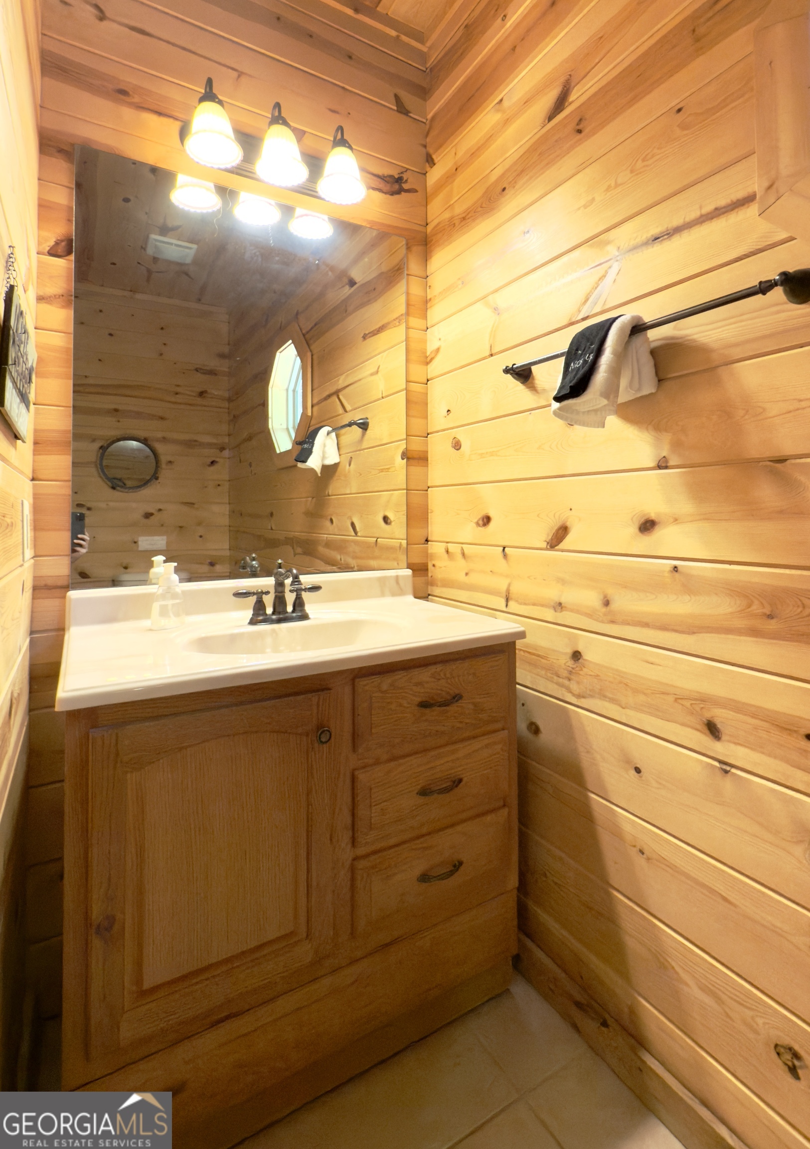 469 Vista View Place Cleveland, GA 30528 - Photo 11 of 39 a bathroom with a sink mirror and