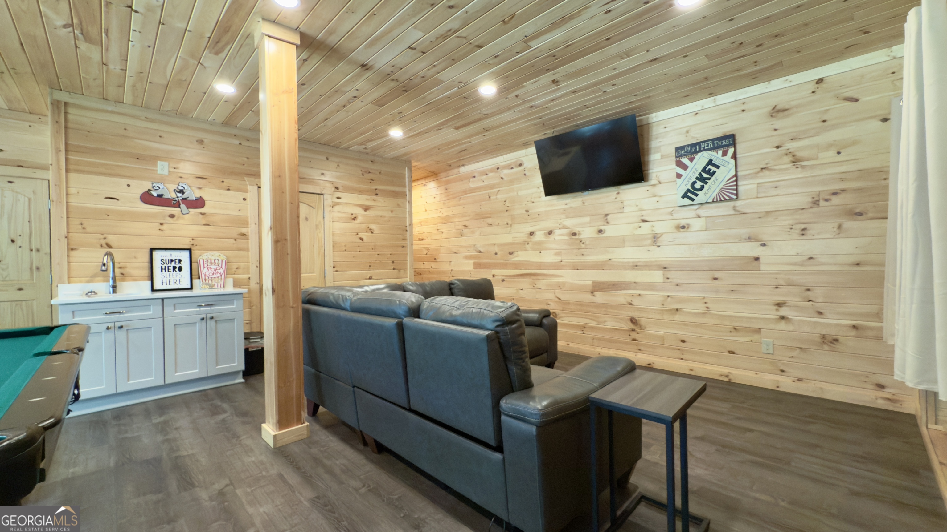 469 Vista View Place Cleveland, GA 30528 - Photo 20 of 39 a living room with furniture and a flat screen tv