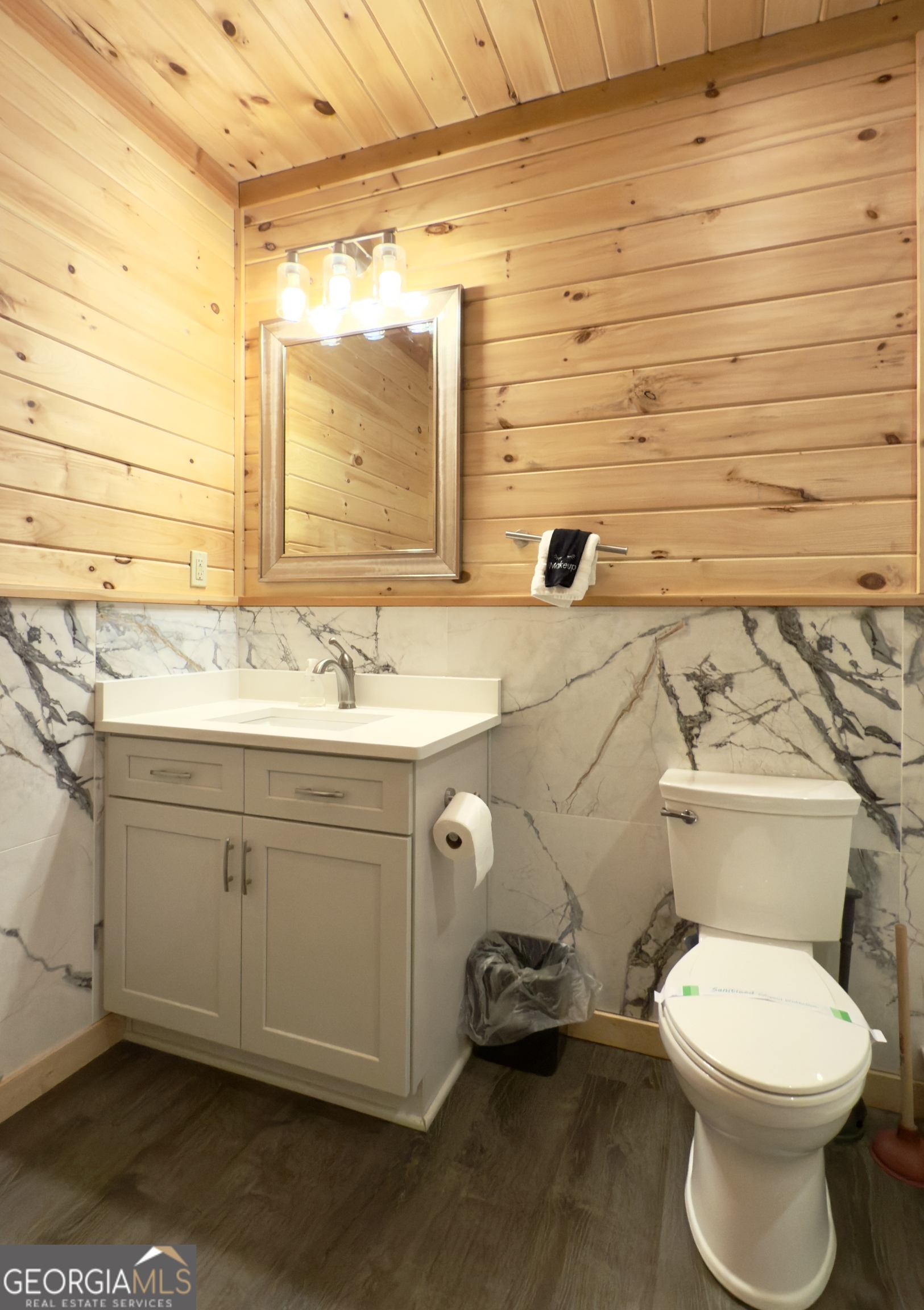 469 Vista View Place Cleveland, GA 30528 - Photo 24 of 39 a bathroom with a toilet sink and mirror