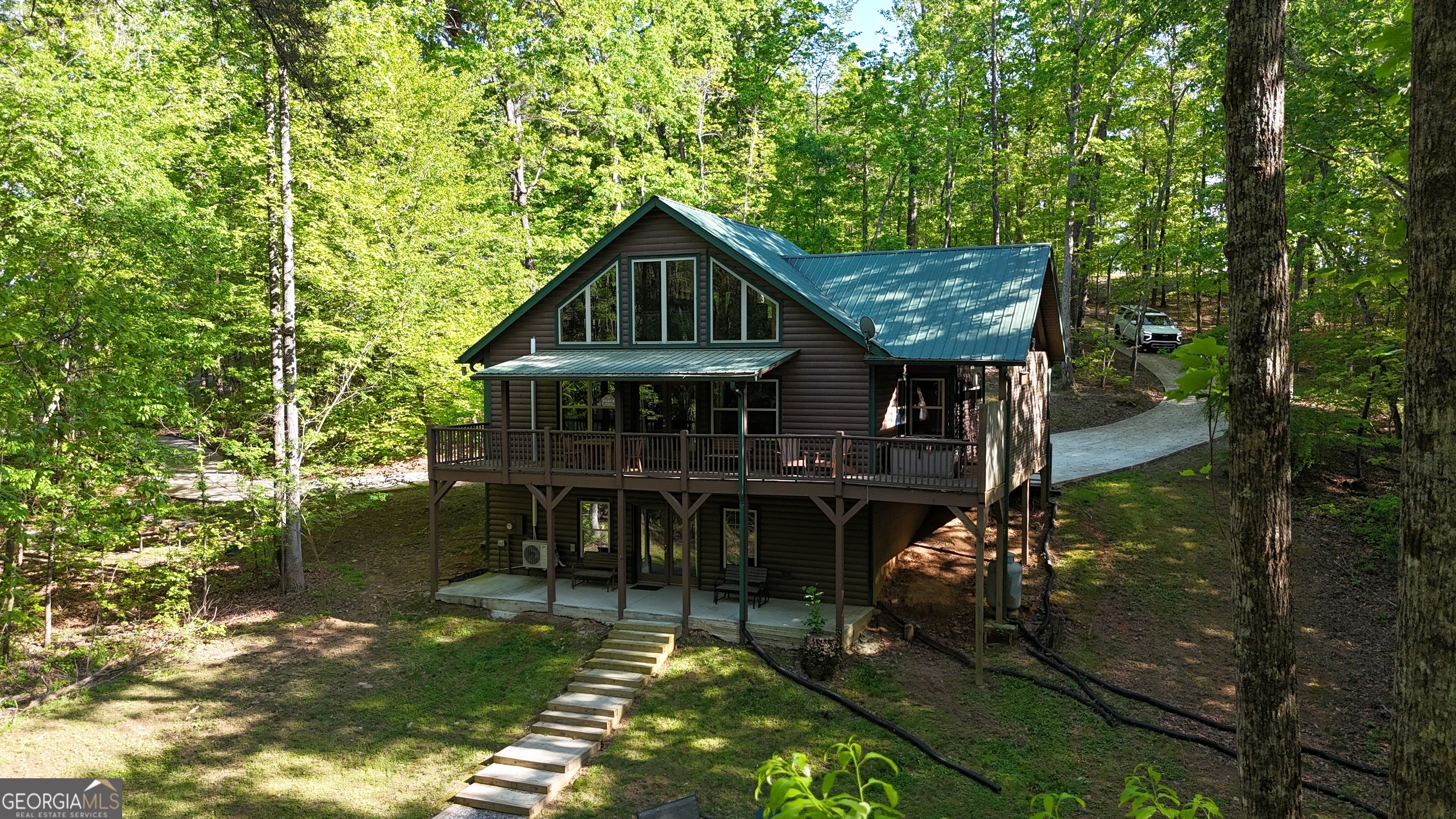 469 Vista View Place Cleveland, GA 30528 - Photo 37 of 39 a front view of a house with a garden
