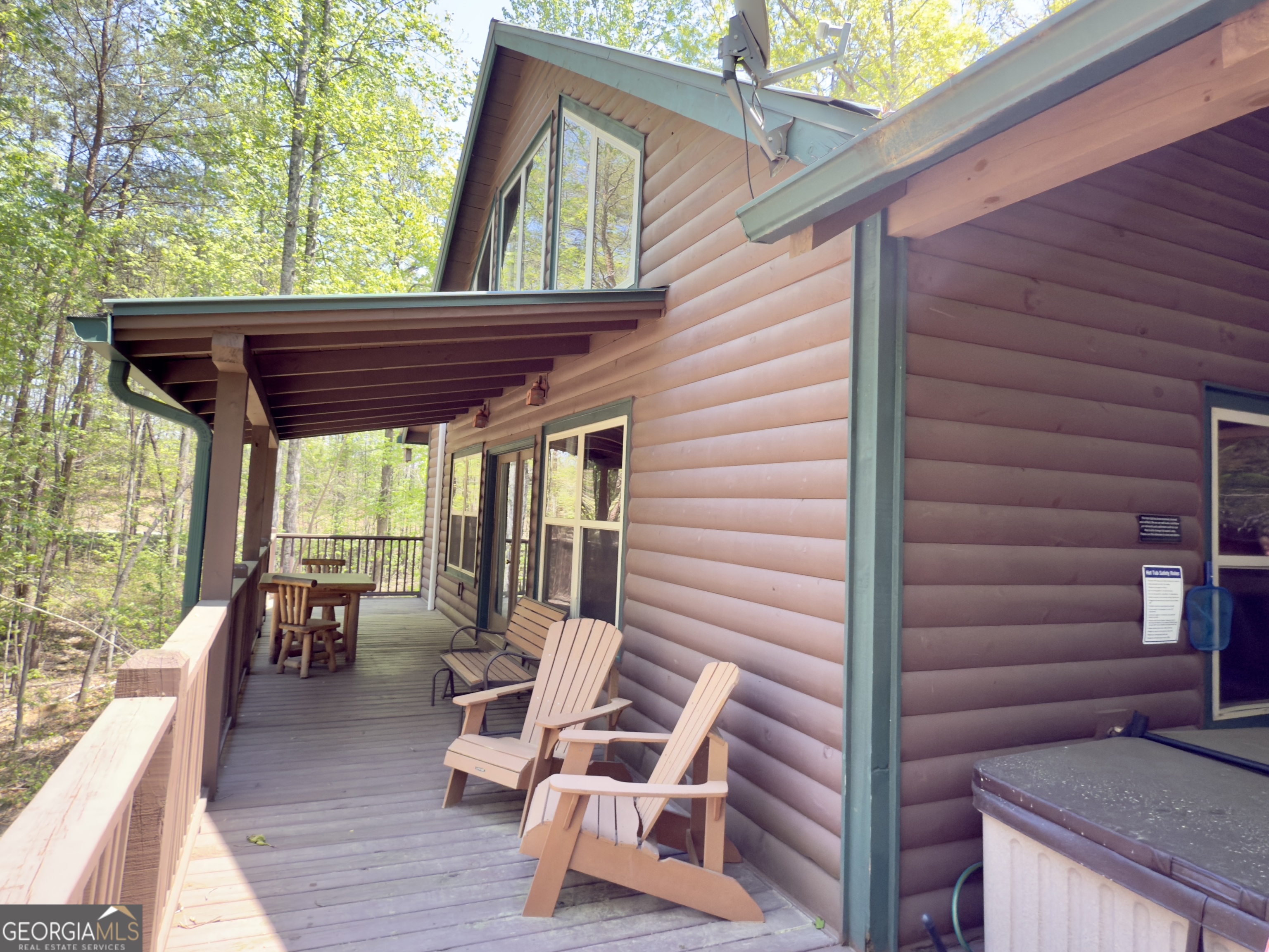 469 Vista View Place Cleveland, GA 30528 - Photo 4 of 39 a view of backyard with deck and outdoor seating