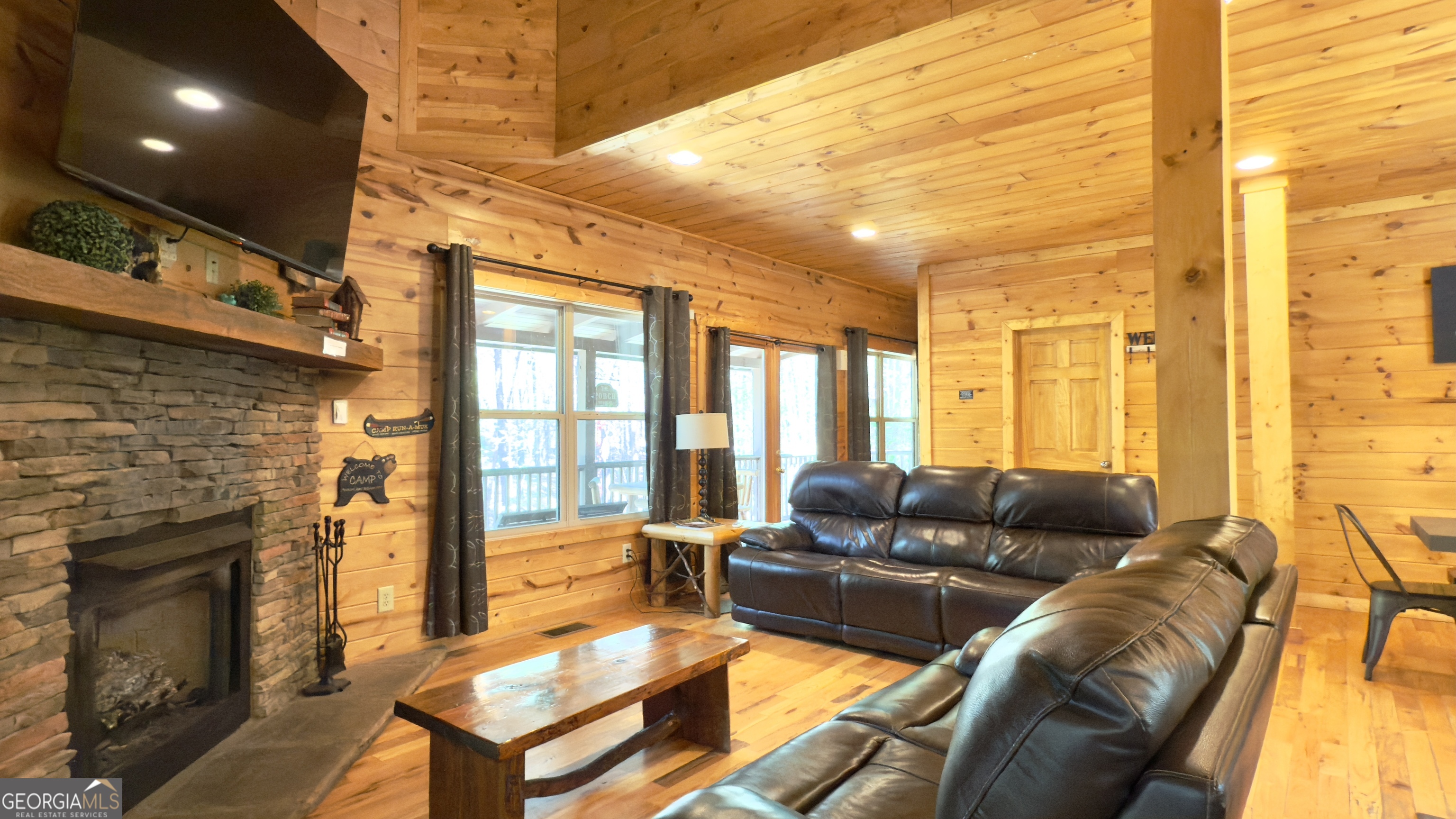 469 Vista View Place Cleveland, GA 30528 - Photo 7 of 39 a living room with furniture fireplace and a large window