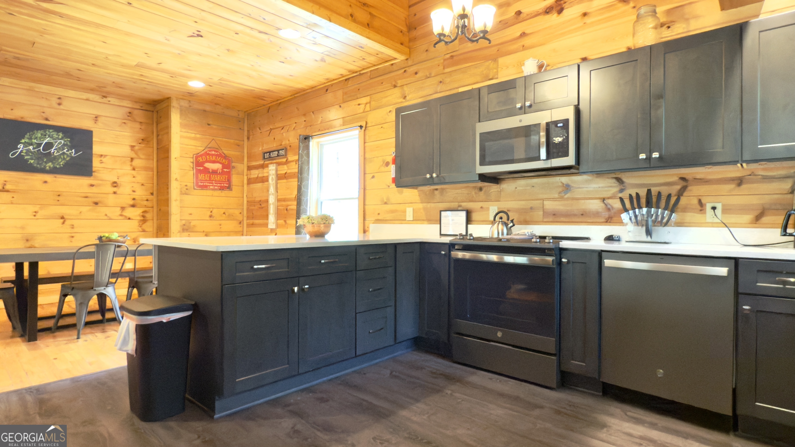 469 Vista View Place Cleveland, GA 30528 - Photo 8 of 39 a kitchen with a sink and a microwave