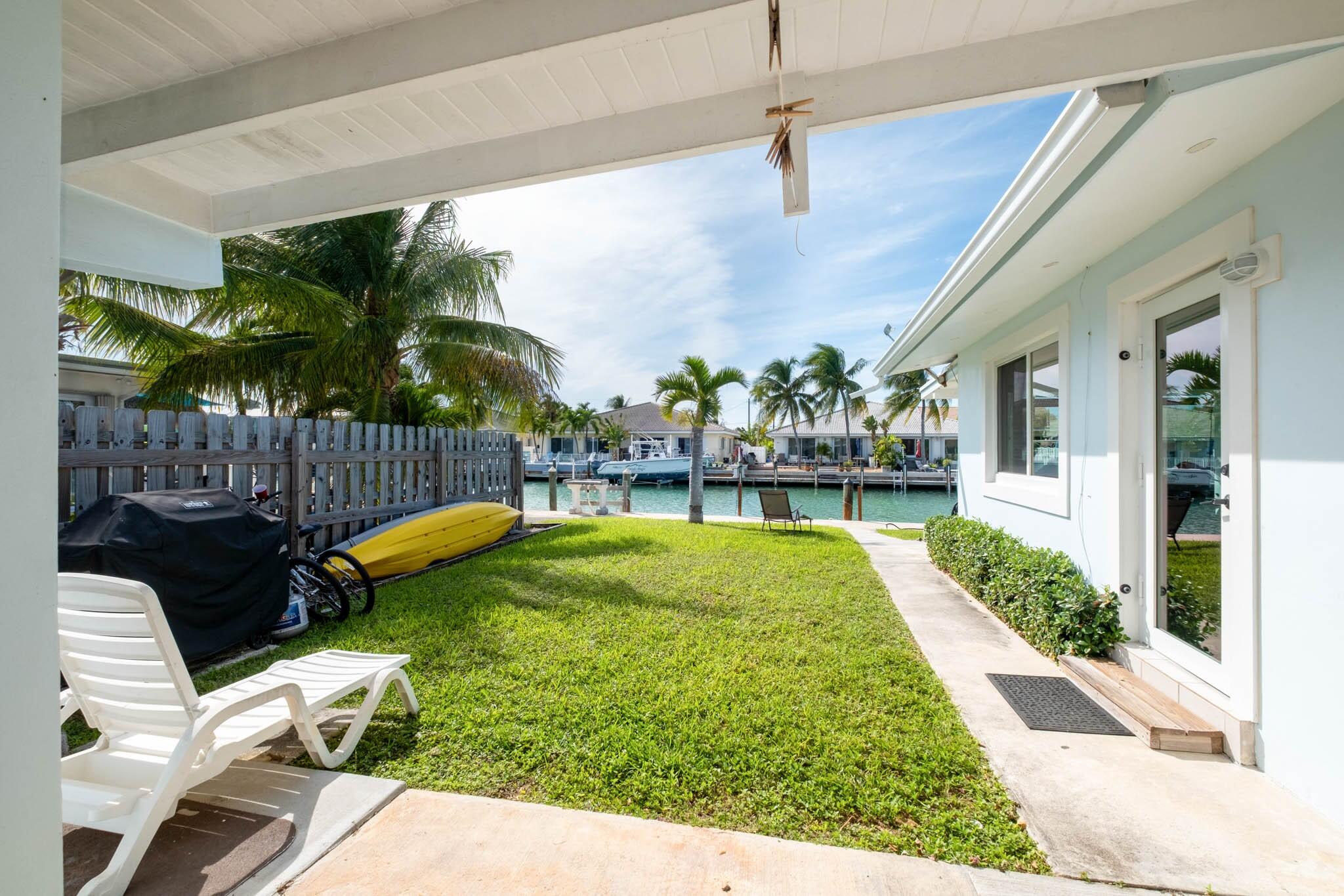 261 9th Street Key Colony Beach, FL 33051 - Photo 22 of 42 261 Carport to Canal