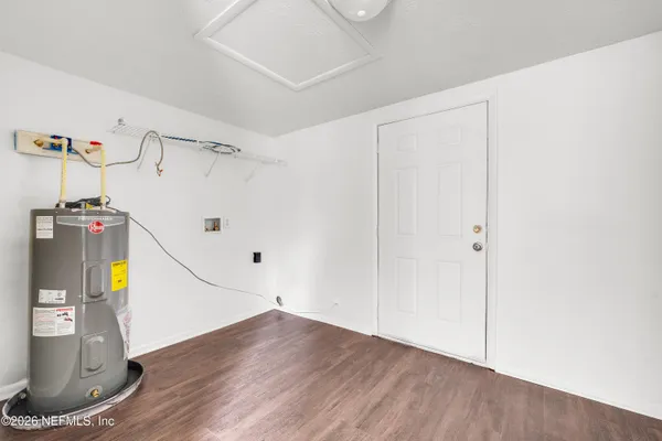 a view of a storage & utility room with wooden floor