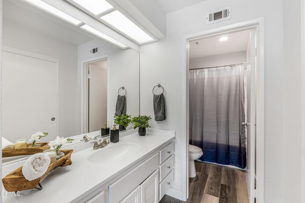 517 Orilla Walk Oxnard, CA 93030 - Photo 15 of 34 a bathroom with a sink a toilet and shower