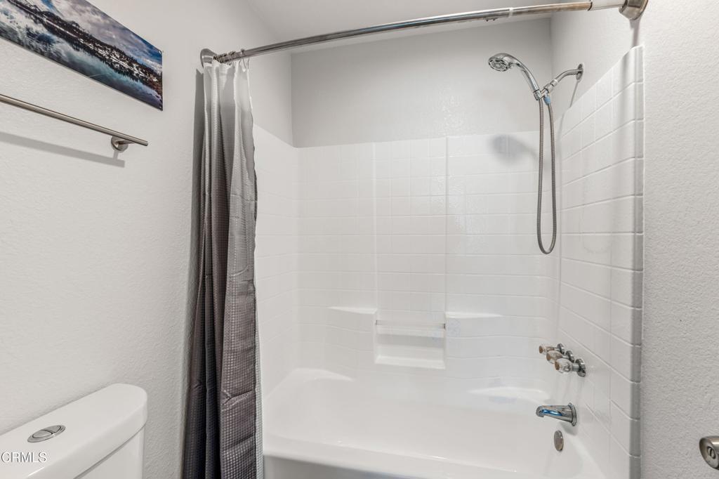 517 Orilla Walk Oxnard, CA 93030 - Photo 16 of 34 a bathroom with a shower and a bath tub
