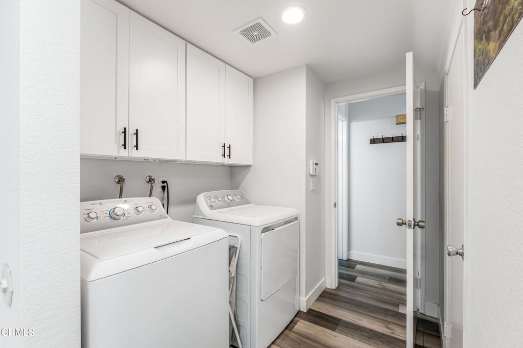 517 Orilla Walk Oxnard, CA 93030 - Photo 24 of 34 a view of storage and utility room with washer and dryer