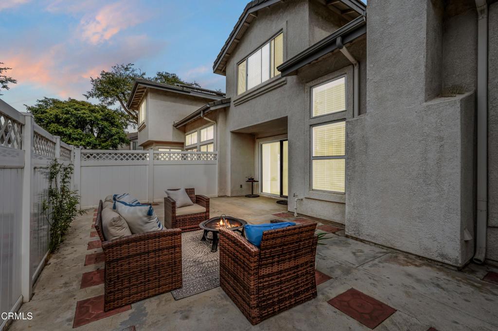 517 Orilla Walk Oxnard, CA 93030 - Photo 25 of 34 a backyard of a house with outdoor seating