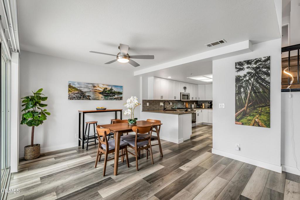 517 Orilla Walk Oxnard, CA 93030 - Photo 6 of 34 a view of a dining room with furniture and a potted plant